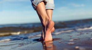 Barefoot Along the Beach Shoreline