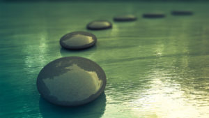 Black Zen Stones on a Sea