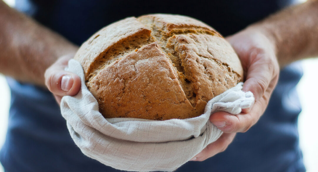 Bread Without Gluten in Hands