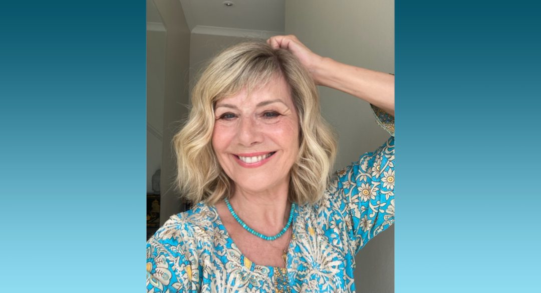 Glynis touching new hair style