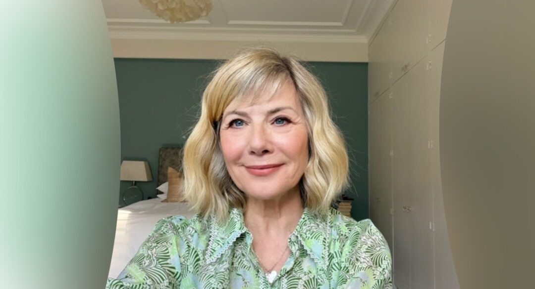 Glynis wearing green and turquoise shirt