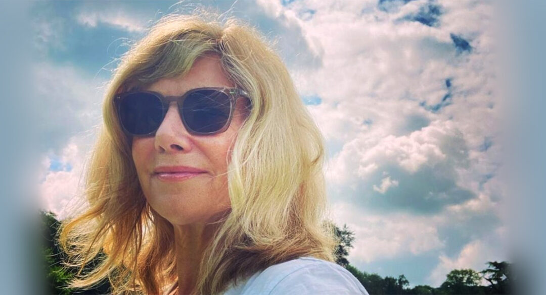 Glynis With Sun Glasses Against Skies