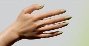 Hand With Green Finger Nails
