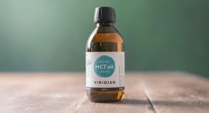 MCT Oil Bottle on Wooden Table