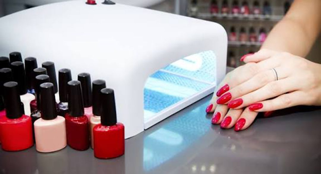 Manicure close-up hands and nail varnishes