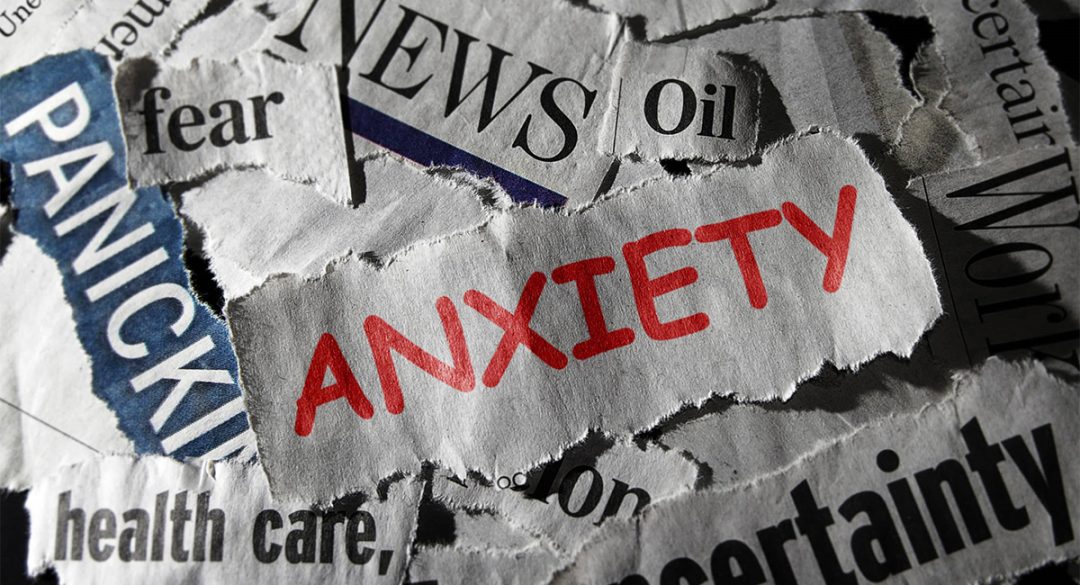 Press Cutting Words with Anxiety in Red