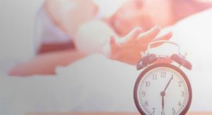 Reaching For Alarm Clock
