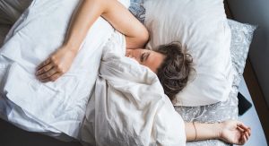 Woman Asleep In Bed