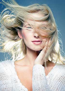 Girl with Beautiful wind-swept blonde hair
